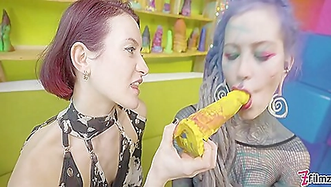 Sexy babe on a dildo fucks herself